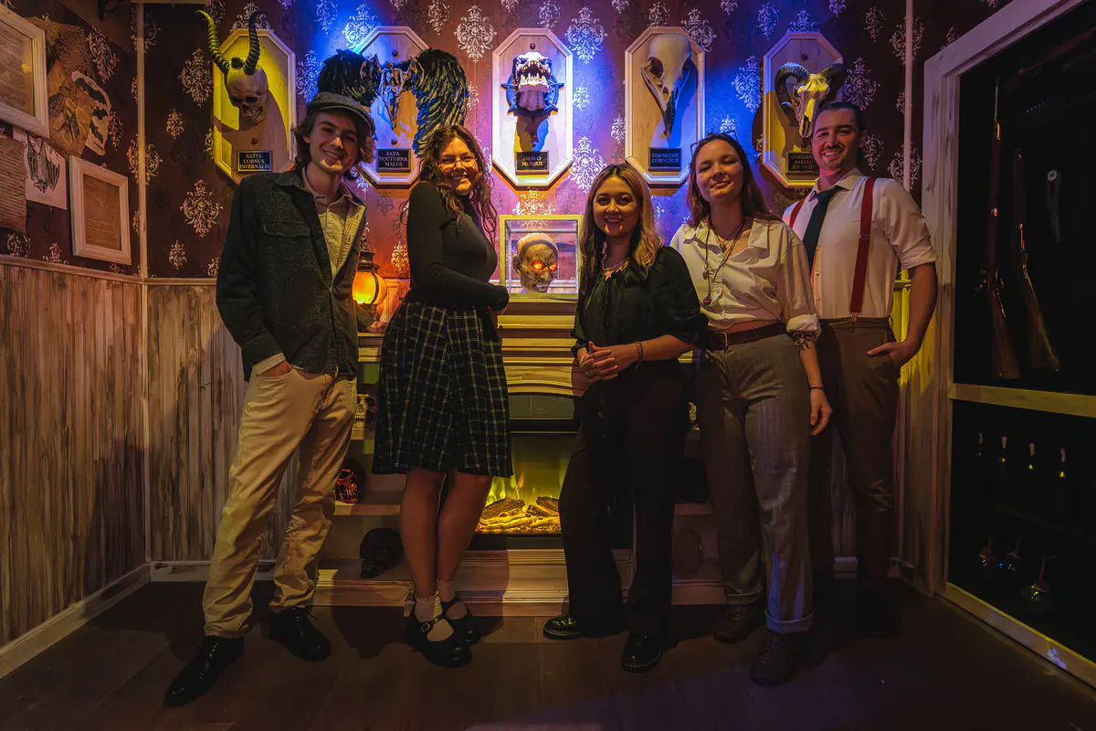 Gothic horror set with candles inside The Eternity Experiment at Labyrinth Boise